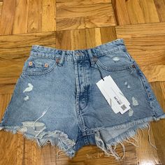 Brand New Ripped Jean Shorts, New With Tags And Adorable Zara Bottoms With Built-in Shorts, High Rise Bottoms With Frayed Hem For Summer, High Rise Bottoms With Frayed Hem For Day Out, Summer High-rise Bottoms With Frayed Hem, Zara Bottoms With Pockets, Short Length, Zara Cutoff Shorts With Pockets, Summer High Rise Bottoms With Pockets, Summer High-rise Bottoms With Pockets, Summer High Waist Bottoms With Frayed Hem