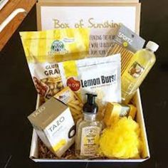 a box of sunshine is packed with lemon burst, soap, hand sanitizers and other goodies