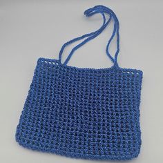 Metallic Blue Handmade Crochet Mini Shoulder Bag 🧶 Beautiful Blue Net Crochet Mini Shoulder Bag 🧶 100% Handmade products. 🧶 100% Polyester 🧶 SIZE : 21 cm x 18 cm ( Strap length: 52 cm )  * Measurements may differ by 1-2 cm. Blue Rectangular Party Shoulder Bag, Blue Handwoven Crochet Bag For Vacation, Blue Crochet Bag For Daily Summer Use, Blue Square Party Bag, Blue Crochet Shoulder Bag For Vacation, Handwoven Blue Crochet Bag For The Beach, Blue Summer Bags Perfect As Gifts, Blue Summer Bags For Gifts, Blue Summer Gift Bags