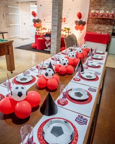 a table set up for a soccer themed party