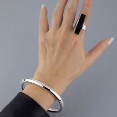 Black Onyx Vertical Bar Ring Sleek Adjustable Jewelry With Polished Finish, Modern Oblong Jewelry With Polished Finish, Modern Onyx Open Ring Jewelry, Modern Black Jewelry, Modern Black Bangle Jewelry, Vertical Bar, Bar Ring, Sterling Silver Bangle Bracelets, Sterling Silver Bangle