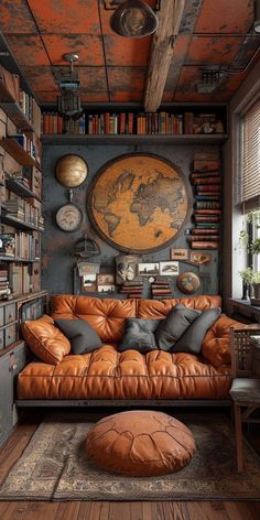 a living room filled with lots of books and furniture