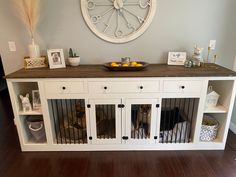 a dog kennel with its doors open and some food on the table in front of it