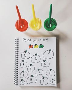 an apple themed activity book for kids to learn the letter g and paint by letters