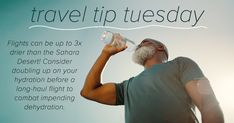 a man drinking from a water bottle while standing in front of a sign that says travel tip tuesday