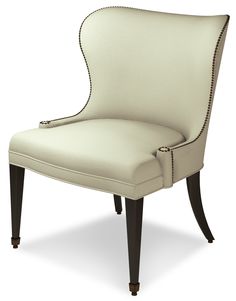 an upholstered white chair with black legs and nail - tipped trimmings