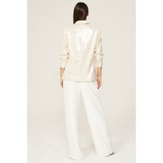 White sequins (100% Polyester). Lining (95% Polyester, 5% Spandex). Blazer. Long sleeves. Collar. Front button closure. 27" from shoulder to hemline. Imported. Formal Sequined Tops For Fall, Glamorous Sequined Tops For Formal Occasions, Elegant Evening Sequin Fabric For Fall, Chic Embellished Sequin Fabric For Holidays, Chic Holiday Embellished Sequin Fabric, Elegant Embellished Sequin Fabric For Fall, Elegant Evening Sequin Fabric For Spring, Chic Fitted Sequin Fabric For Holidays, Chic Fitted Holiday Sequin Fabric