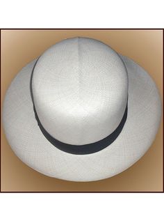 Brand: Gamboa Color: Natural Material: Toquilla Straw Brim: 8 cm. (3 1/10")Grade: 13 - 14 (Fine Fine)learn more Sweatband: Cotton Twill, 3 cm. (1.18") Crown: 11 cm. (4 1/3") Ribbon: Linen Description: A luxurious hat, handmade in Montecristi, the worldwide famous Panama Hat town in Ecuador. This Panama Colonial (Optimo) hat is a top quality, classic and elegant hat. Each hat is individually blocked and trimmed to meet the highest quality standards.Roll Up White Brimmed Panama Hat For Formal Occasions, White Formal Panama Hat, Elegant White Hat With Flat Crown, Classic White Hat, Classic White Hat With Flat Crown, Classic White Flat Crown Hat, White Formal Hat With Flat Crown, Classic White Straw Hat With Flat Crown, Classic White Flat Crown Straw Hat