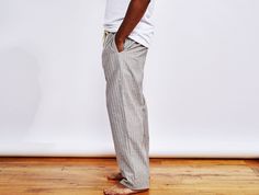 Coyuchi | Men's Organic Crinkled Pajama Pant XLarge Mid Gray Stripe | Cool and comfy all night long, our pajama pants are made from soft, breathable percale. To create our softest, most relaxed pajamas yet, we took pure organic cotton and applied proprietary spinning and weaving to create a washed fabric that feels as comfy and relaxed as it looks. Styled with elasticized drawstring waist and side-seam pockets. We recommend referencing the size chart for accurate measurements. 100% organic cotto Comfortable Cotton Sleep Pants, Cotton Wide Leg Sleepwear For Relaxation, Wide Leg Cotton Sleepwear For Relaxation, Relaxed Cotton Sleep Bottoms, Cotton Relaxed Fit Sleep Bottoms, Relaxed Fit Cotton Sleep Bottoms, Relaxed Cotton Sleep Pants, Relaxed Cotton Pants For Relaxation, Relaxed Fit Straight Leg Sleep Pants