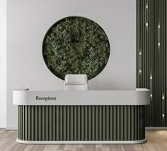 the reception desk has a circular green plant on it's wall and is surrounded by lights