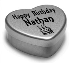 a heart shaped tin with the words happy birthday matteo on it