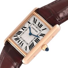 Cartier Tank Louis Rose Gold Mechanical Mens Watch WGTA0011. Manual winding movement. 18k rose gold case 25 mm x 33 mm. Circular grained crown set with a blue sapphire cabochon. . Scratch resistant sapphire crystal. Silvered guilloche dial with black Roman numeral hour markers and an inner minute track. Sword shaped blued hands. Secret Cartier signature at VII. Brown leather strap with 18K rose gold tang buckle. Classic Rose Gold Watch With Rectangular Dial, Cartier Rectangular Business Jewelry, Formal Cartier Watch Accessories, Rectangular Shape, Cartier Rectangular Watch Accessories For Formal Occasions, Cartier Rectangular Watch Accessories For Formal Events, Formal Rectangular Cartier Watch Accessories, Timeless Rectangular Rose Gold Watch Accessories, Timeless Rose Gold Rectangular Watch Accessories, Timeless Rectangular Rose Gold Watch