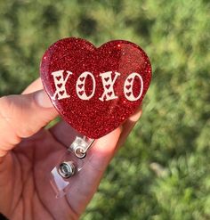 "Valentine's Day Badge Reel ♥️ These reels make the perfect gift for any name badge. These badge reels are made to order so slight variations and imperfection may happen. I do try my best to make each one as perfect as I can.  *Colors may look slightly different in person due to screen resolution* Badge reel is retractable and reaches 26.5\" inches. Heart Badge is 2\"x2\" Care Instructions: Do not leave in hot or cold car. Handle with care. No refunds after 24 hours of time order was placed. If there is any issue with your order, please message me and I will try to resolve it to the best of my ability.  Please be sure to include a correct and valid mailing address when placing your order. If your package is returned to me, I can reship it but the customer will be responsible for the additi Car Handle, Badge Ideas, Name Badges, Nurse Badge, Retractable Badge Reel, Valentine Heart, Id Badge, Leave In, Badge Reel