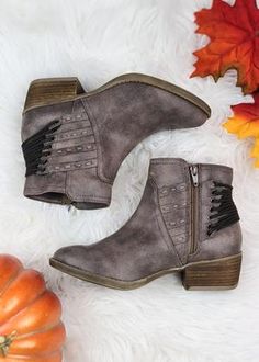 These booties will perfect for truckin' around the pumpkin patch and checking out Christmas lights! The strappy detail adds a little sass and edge and the comfort can't be beat! These booties are VERY true to size, consider sizing up especially for sock room! Cowboy Boots