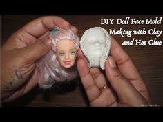 a hand holding a small doll next to a fake human head with the words diy doll face mold making with clay and hot glue