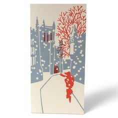 a greeting card with a red and blue illustration of a woman walking in the snow