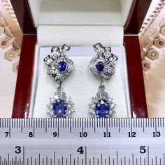 ENJOY OUR WORRY-FREE SERVICE AND THE DAZZLING, GENUINE JEWELRY WE DESIGN AND HANDCRAFT WITH LOVE❤️ ABOUT THE ITEM: STUNNING CEYLON BLUE SAPPHIRES AND NATURAL DIAMONDS, SET IN SIMPLE YET BEAUTIFUL 18K SOLID WHITE GOLD CHANDELIER EARRINGS WITH SCREWED BACK. Handcrafted, one of a kind earrings! Sparkling blue sapphire, and top grade, white and clean diamonds. These earrings will make you feel like a princess! SUGGESTED RETAIL VALUE: $9,800  BLUE SAPPHIRES: Weight: bottom 2 pieces, 2.58 carats, top Blue Platinum Earrings For Wedding, Exquisite Sapphire Wedding Earrings, Sapphire Diamond Cut Earrings For Wedding, Sapphire Hallmarked Earrings For Wedding, Wedding Sapphire Drop Diamond Earrings, Wedding Sapphire Diamond Cut Earrings, Formal Diamond Gemstone Chandelier Earrings, Brilliant Cut Sapphire Earrings For Wedding, Sapphire Brilliant Cut Earrings For Wedding