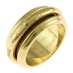 Used Piaget Possession Ring, Size 13, 18k Gold, For Women, Piaget (Sku: Gzl13gtl) === General === Brand : Piaget === Design === Type : Band Ring Gender : Women Color : Yellow Gold Material : Yellow Gold (18k) Handmade : Yes Season : Fall/Winter, Spring/Summer === Size === Other Size : 13 Width : 9mm / 0.35'' Weight : 3.3g / 0.11oz. === Included Items === Accessories Notice : Before Purchasing, Please Refer To The Images Of The Accessories Included With The Item. === Condition === Condition : Use Piaget Possession, Gold For Women, Woman Colour, Gold Material, Band Ring, Size 13, Band Rings, 18k Gold, Ring Size