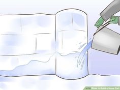 a person pouring water into an ice block with the help of a gloved hand