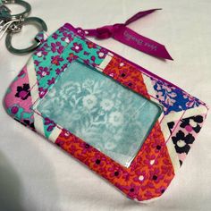 Nwt - Brand New Vera Bradley Lanyard Wallet. *Item Comes From A Smoke-Free Home. Purple Rectangular Bag With Card Slots, Rectangular Multicolor Wallets, Everyday Multicolor Rectangular Wallets, Multicolor Rectangular Card Holder For Daily Use, Purple Pouch Wallet For Daily Use, Multicolor Rectangular Card Holder For Personal Use, Purple Travel Wallet Pouch, Purple Travel Pouch Wallet, Purple Pouch Wallet For Travel