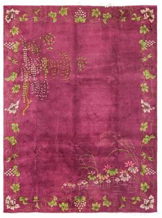 a pink rug with flowers and vines on it