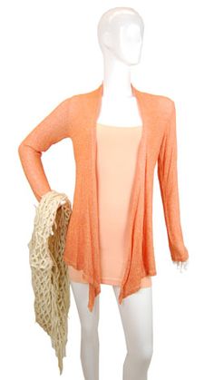 Necessity Cardigan, Orange Spring Layering Orange Sweater, Orange Long Sleeve Cardigan For Spring, Spring Orange Knit Outerwear, Orange Knit Outerwear For Spring, Spring Wrap Sweater In Soft Knit, Orange Fitted Long Sleeve Cardigan, Fitted Long Sleeve Orange Cardigan, Fitted Orange Long Sleeve Cardigan, Orange Long Sleeve One Size Cardigan