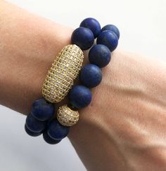 "Trendy Stacked bracelets are an easy way to accessorize any outfit! So versatile, wear a single bracelet or multiples. ~Matte Lapis Gemstones ~Your Choice: Lapis with Oval CZ Pave or Lapis with CZ Pave Ball Bead ~Bracelets approx 7\" ~Specially packaged and ready for gift giving Please visit my shop for more great jewelry finds: www.ChrisKateJewelry.etsy.com Current Processing Times All of my items are lovingly handcrafted and made-to-order so please be sure to view my shop announcement on my s Blue Stackable Stretch Bracelet For Everyday, Everyday Stackable Blue Bracelets, Everyday Blue Lapis Lazuli Beaded Bracelets, Blue Jubilee Bracelet For Everyday Wear, Blue Jubilee Stretch Bracelet, Everyday Blue Jubilee Bracelet, Blue Beaded Bangle Bracelets For Everyday, Everyday Blue Beaded Bangle Bracelets, Everyday Blue Beaded Bangle Bracelet