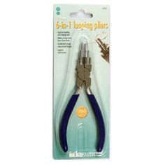 a pair of scissors with blue handles and black handles on the front, in packaging