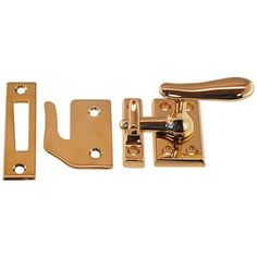 brass plated door handles and latches on a white background