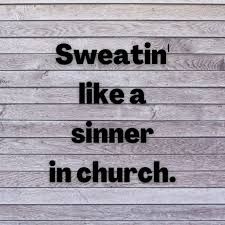 the words sweatin'like a slimmer in church are written on wood planks