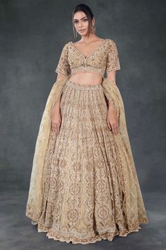 Get ready to turn heads with our Bridal Lehenga BL-335! Featuring elegant gold tones and intricate zardozi and sequin work, this lehenga exudes pure sophistication. Perfect for your reception day, it will make you feel confident and ready to take on the world!