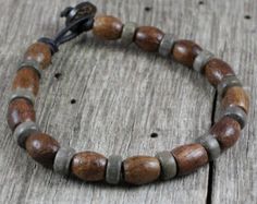 Mens Mala Bracelet Leather Wood Beaded by SolCreationsJewelry Rustic Wooden Beads Bracelet, Rustic Brown Beaded Bracelets With Wooden Beads, Rustic Brown Wooden Beaded Bracelets, Mens Mala Bracelet, Mens Bracelet Designs, Leather Cord Bracelets, Beaded Jewelry Necklaces, Surfer Bracelets, Bracelet Leather