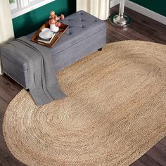 a living room scene with focus on the rug and coffee table in the centerpiece