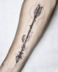 an arrow and bow tattoo on the arm