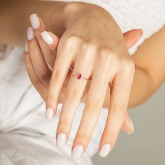 14k Solid Gold Pear Ruby Ring | Drop Shape Red Ruby Ring | Wedding Ring | Romantic Minimal Ring | Yellow Rose White Gold Jewelry for Her Features: * Custom-Made to Perfection. * Gold Karat: 14k * Gold Color Variations: Choose from Yellow Gold, Rose Gold, or White Gold. * Band Width: 2.03 mm * Gemstone Cut: 4x3 mm * Primary Gemstone: High-Quality Lab-Created Ruby Shipping Information: We share your anticipation for the arrival of your order and are equally eager to deliver it to you. Our commitment to handling each order with utmost care reflects in our efficient and prompt processing. Processing Time: Your order will be meticulously prepared for shipping within 1-3 business days. Complimentary Shipping: We offer free shipping, ensuring your order arrives typically within 3-5 business days Dainty Rose Gold Ruby Promise Ring, Heart Cut Dainty Birthstone Ring For Wedding, Dainty Heart Cut Birthstone Ring For Wedding, Elegant Red Heart Ring In 14k Gold, Elegant Red 14k Gold Heart Ring, Heart Cut Ruby Ring In Yellow Gold For Wedding, Ruby Heart Cut Birthstone Ring For Wedding, 14k Gold Pear-shaped Ruby Ring For Wedding, Heart-shaped Ruby Ring In 14k Gold For Wedding