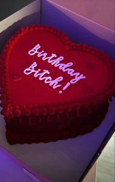 a heart shaped birthday cake in a box