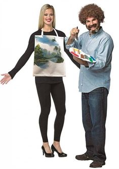 a man and woman are dressed up as artist with an apron holding paintbrushes