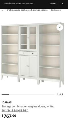 a white bookcase with glass doors on the front and bottom, is for sale