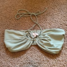 Camila Coelho Nwt Halter Bikini Top In Size Extra Large. Pale Sage Green Color. Adjustable Halter Straps. Boning In The Sides Of The Cups For Extra Support. No Boning/Wiring On The Bottom Of The Cups. I Bought This For Myself But It’s Not Quite The Right Size. See Photos For Approximate Measurementssince It’s Adjustable, It’s Not Exact. Tags: Swim, Swimwear, Resort, Swimsuit, Swimming, Beach, Pool, Vacation, Resort Wear Chic Beach Swimwear With Drawstring, Chic Spring Halter Top For Pool, Spring Beach Crop Top With Drawstring, Spring Pool Crop Top, Green Bandeau Crop Top For Beach, Bandeau Top With Tie Back For Beach, Bandeau Tie Back Top For Beach, Bandeau Tie-back Top For Beach, Fitted Drawstring Halter Top For Vacation