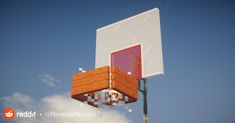 an image of a basketball hoop in the air with clouds behind it and blue sky