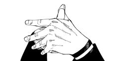 a person's hand pointing to the left with their fingers on top of each other