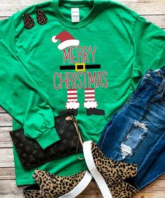 Merry Christmas! Get in the holiday spirit with this Merry Christmas Santa Shirt. This festive design pairs perfectly with leggings, a vest, and booties! Show your Christmas spirit in a big way this year. Available in youth to adult.  *6.0 oz., pre-shrunk 100% cotton *Double-needle stitched neckline and sleeves*Quarter-turned*Seamless seven-eighths inch collar*Taped neck and shoulders*Satin label*Rib cuffs Santa Tee, Santa Shirt, Merry Christmas Santa, Santa Shirts, Festive Design, Christmas Santa, Christmas Spirit, Holiday Spirit, Svg Files