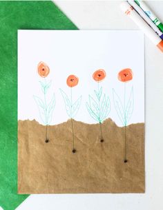 an art project for kids with flowers on paper