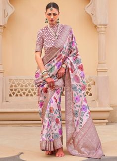 Indulge in the luxurious elegance of our Light Pink Floral Printed Silk Saree! Perfect for weddings, parties, and traditional events, this designer piece features a beautiful XO pallu and border with exquisite brocade detailing. Stand out in style and radiate grace and sophistication with this must-have saree for women. The unstitched blouse can be customized upto 44 inches. Do Note: All the accessories shown are for styling purpose only. Slight color variation may occur due to photographic reas Party Wear Traditional, Brocade Blouse, Indian Designer Sarees, Party Sarees, Latest Designer Sarees, Women In India, Sarees For Women, Traditional Saree, Ghagra Choli