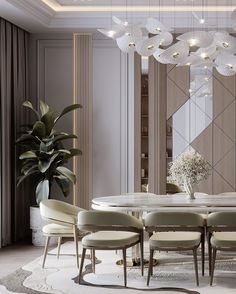 an elegant dining room with white chairs and chandelier