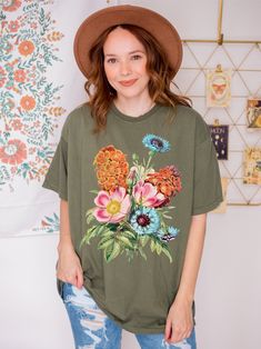 Printed on Comfort Colors crewnecks, this wildflower sweatshirt has a comfortable and vintage look with a unique garment-dyed design. Crafted from 100% ring-spun cotton with an on-trend relaxed fit - ideal for wearing oversized! Please check our size charts for the perfect fit! Oversized Floral Print T-shirt For Spring, Green Tops With Plant Print For Fall, Botanical Relaxed Fit Tops For Fall, Botanical Crew Neck T-shirt With Relaxed Fit, Oversized Floral Embroidered Crew Neck Top, Oversized Floral Embroidery Crew Neck Top, Green Floral Print Fall T-shirt, Green Floral Print T-shirt For Fall, Cottagecore Graphic Print Crew Neck Top