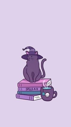 a purple cat sitting on top of some books