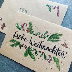 two christmas cards with german writing on them