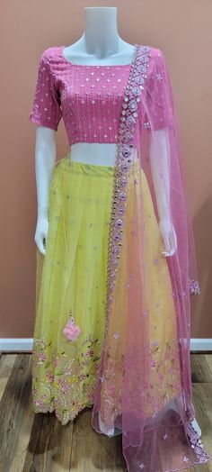 Organza Lehenga Set in Pink and Yellow Length- 38 Inches Crop top- 34 inches Crop top length- 15 inches. Fitted Yellow Palazzo Set For Reception, Yellow Organza Lehenga With Resham Embroidery, Yellow Organza Choli For Festivals, Pink Blouse Yellow Lehenga, Pink Cutdana Organza Choli, Yellow Pink Combination Lehenga, Crop Top Lehenga, Organza Lehenga, Indian Outfits Lehenga