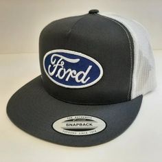 Brand New High-Quality Embroidered Patch On A Vintage Trucker Snapback Hat Cap Adjustable Trucker Hat With Embroidered Logo And Flat Brim, Embroidered Logo Trucker Hat With Flat Bill, Flat Bill Trucker Hat With Embroidered Logo, One Size, Embroidered Logo Flat Bill Trucker Hat, Gray Snapback Cap With Embroidered Logo, Gray Hat With Logo Patch And Curved Brim, Gray Hat With Embroidered Logo And Curved Bill, Gray Snapback Hat With Embroidered Logo, Gray Curved Bill Hat With Embroidered Logo